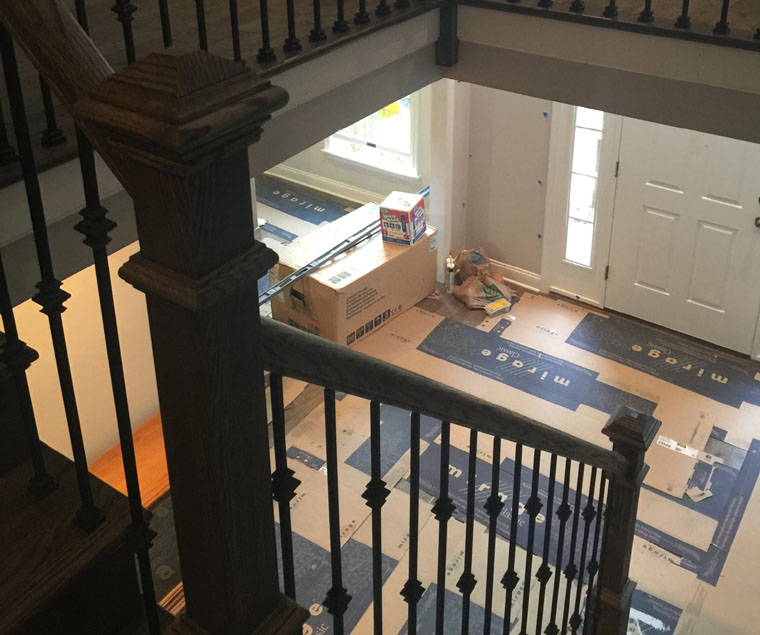 New stairwell with wrought iron spindles